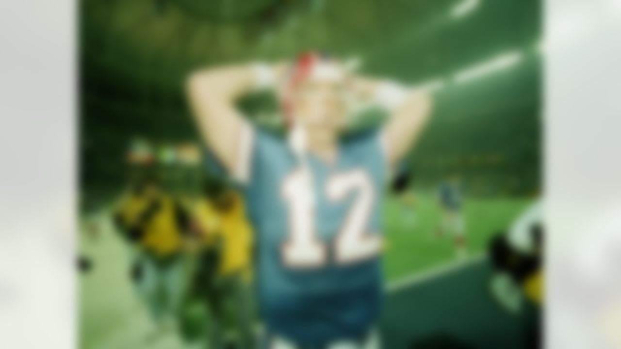 Buffalo Bills' Jim Kelly leaves the field after his team lost the Super Bowl to the Dallas Cowboys Jan. 30, 1994, at the Georgia Dome in Atlanta. In a rematch to last year's Super Bowl, the Cowboys repeated the outcome, this time with a score of 30-13. (AP Photo/Amy Sancetta)