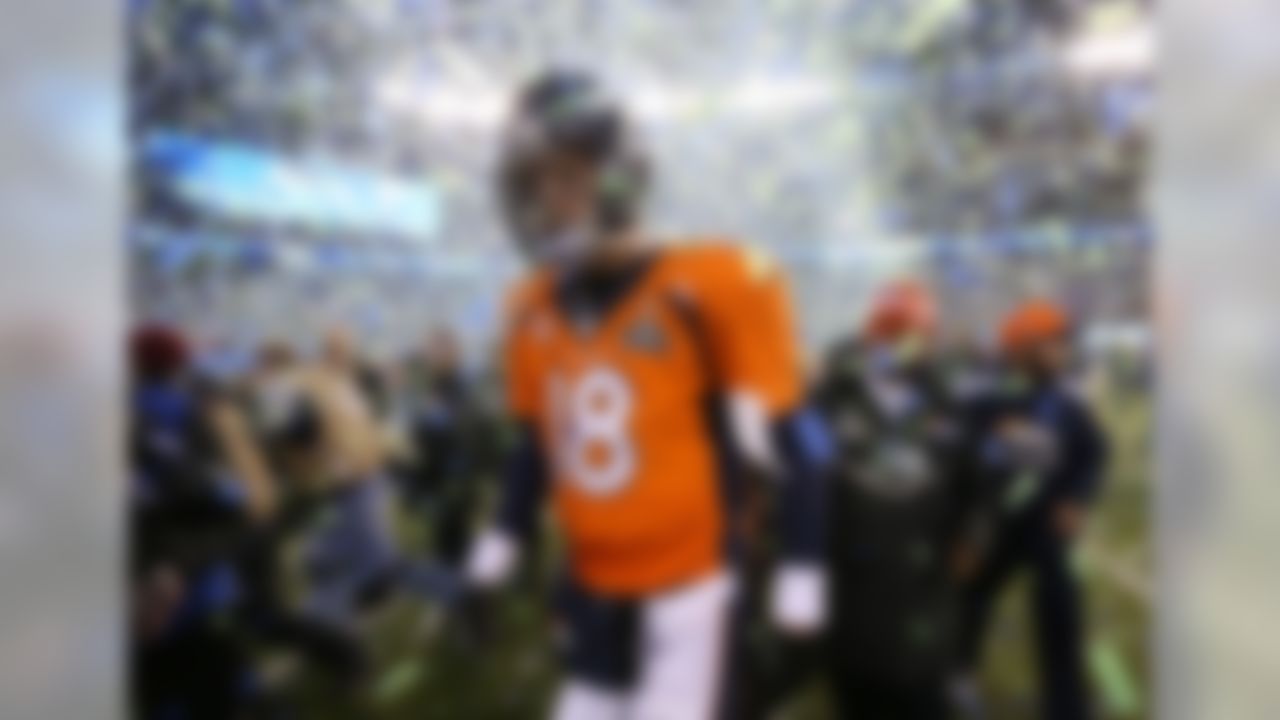 Denver Broncos quarterback Peyton Manning (18) is seen walking off the field after the Seattle Seahawks defeated the Broncos 43-6 in Super Bowl XLVIII at Metlife Stadium on Sunday, Feb. 2, 2014, in East Rutherford, N.J. (Ben Liebenberg/NFL)