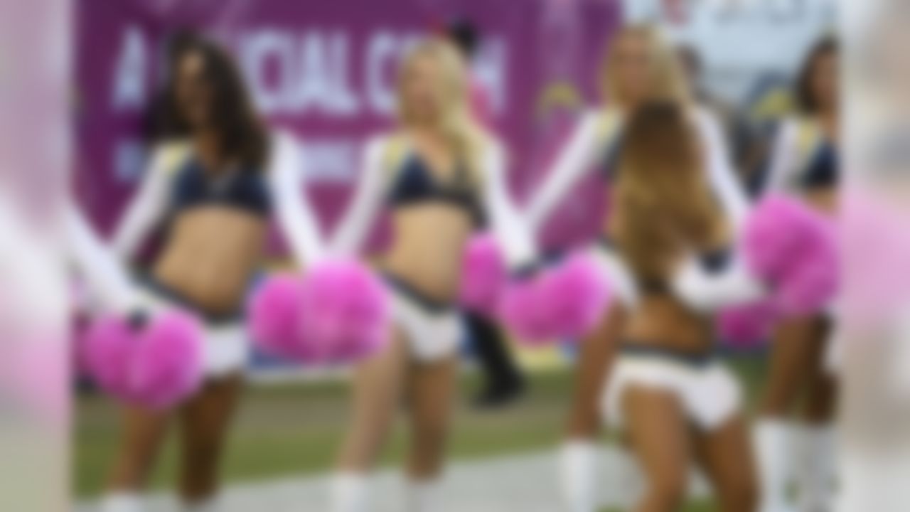 San Diego Chargers cheerleaders perform using pink pompoms  in honor of Breast Cancer Awareness during the first half of an NFL football game against the Pittsburgh Steelers  Monday, Oct. 12, 2015, in San Diego. (AP Photo/Denis Poroy)