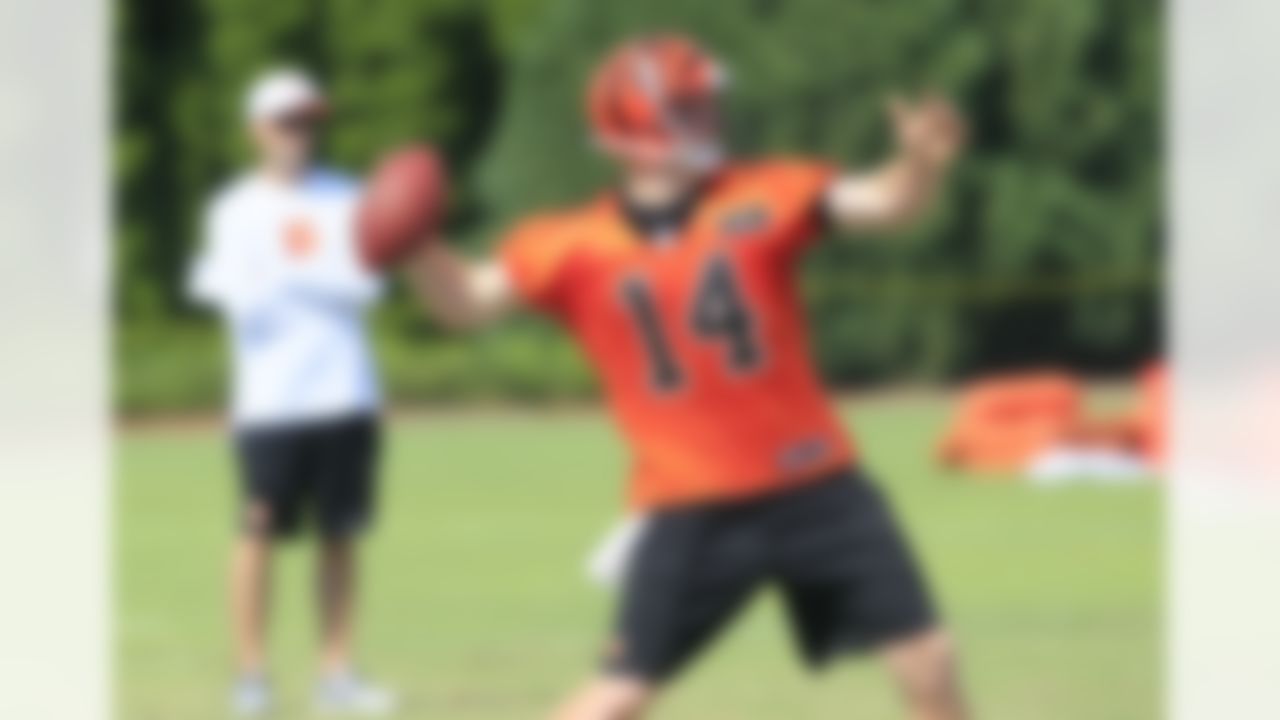 Cincinnati Bengals quarterback Andy Dalton throws a pass during the NFL team's football practice, Wednesday, Aug. 8, 2012, at training camp in Cincinnati. (AP Photo/Al Behrman)