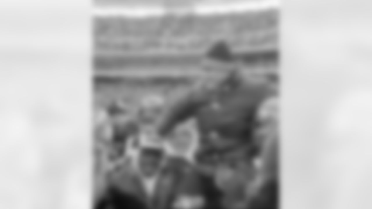 Cincinnati Bengals coach Forrest Gregg is carried off the field by jubilant players and fans after the Bengals defeated the San Diego Chargers in the AFC Championship playoff game in Cincinnati, Ohio, Jan. 10, 1982. The win gives the Bengals their first Super Bowl position. (AP Photo)