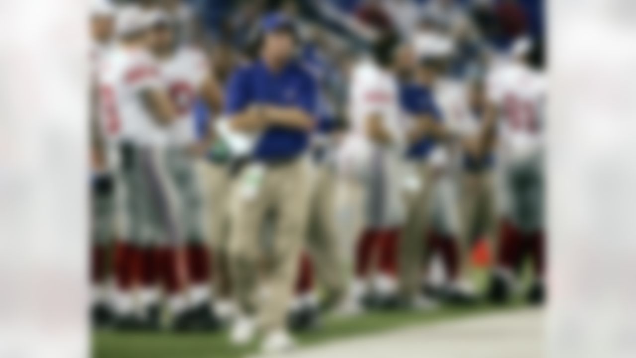 New York Giants head coach Tom Coughlin walks the sidelines during the fourth quarter of their pre-season football game against the Baltimore Ravens on Aug. 11, 2006 in Baltimore. (AP Photo/Chris Gardner)