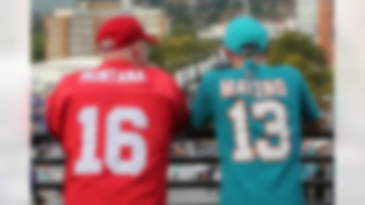 NFL fans wait outside Wembley Stadium wearing Dan Marino and Joe Montana jerseys before kickoff between the Oakland Raiders and Miami Dolphins. (Dave Shopland/NFL)