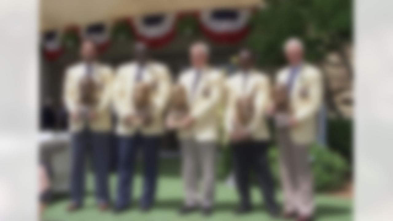 The 1993 class of inductees poses with their busts in front of the Pro Football Hall of Fame in Canton, Ohio. From left are Dan Fouts, Larry Little, Chuck Noll, Walter and Bill Walsh. Noll, the Hall of Fame coach who won a record four Super Bowl titles with the Pittsburgh Steelers, died Friday night, June 13, 2014, at his home. He was 82. The Allegheny County (Pa.) Medical Examiner said Noll died of natural causes. (AP Photo/Bruce Zake)