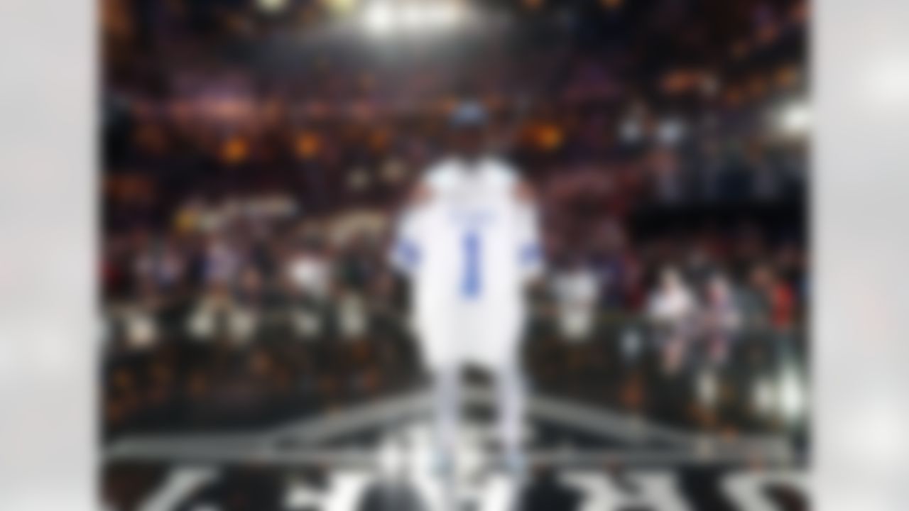 Ohio State�s Ezekiel Elliott poses for photos after being selected by Dallas Cowboys during the 2016 NFL Draft at the Auditorium Theatre on Thursday, April 28, 2016 in Chicago. (Ben Liebenberg/NFL)