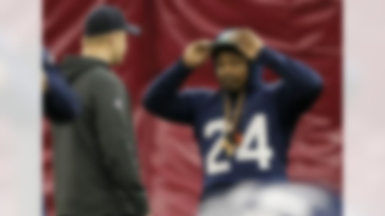 Seattle Seahawks' Marshawn Lynch adjusts his cap during a team practice for NFL Super Bowl XLIX football game, Friday, Jan. 30, 2015, in Tempe, Ariz. The Seahawks play the New England Patriots in Super Bowl XLIX on Sunday, Feb. 1, 2015. (AP Photo/Matt York)