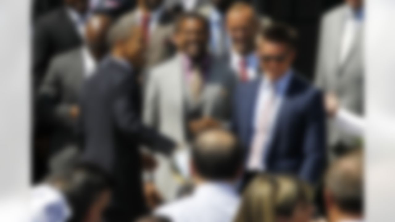 President Barack Obama meets with members of the New York football Giants, on the South Lawn at the White House in Washington, Friday, June 8, 2012, during a ceremony where the president honored the Super Bowl XLVI champions New York Giants. (AP Photo/Charles Dharapak)