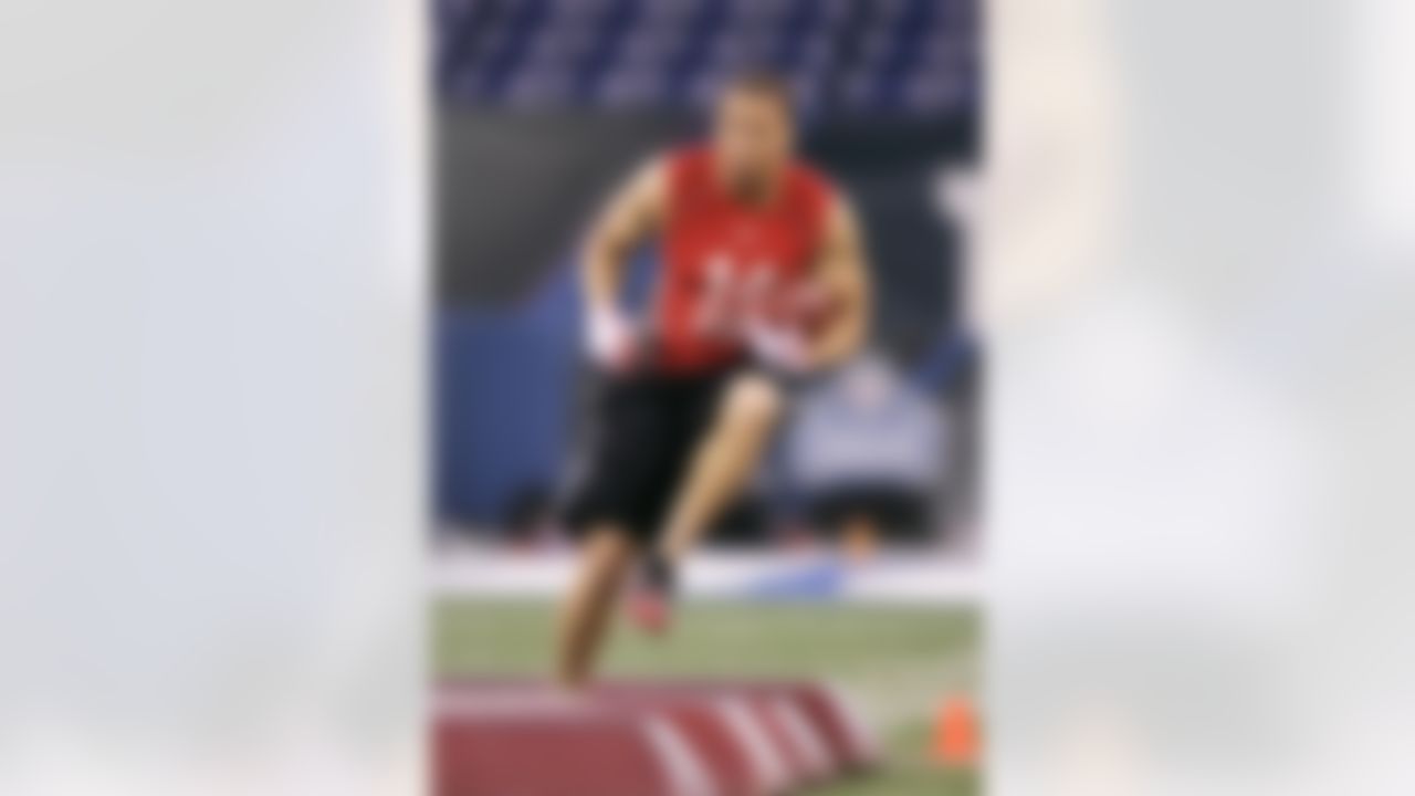 Ian Johnson went from collegiate folk hero to every young girl's Prince Charming to an undrafted free agent, trying to make a roster boasting the NFL's top RB.
Video: On the Fringe, Ian Johnson
(AP Photo/Michael Conroy)