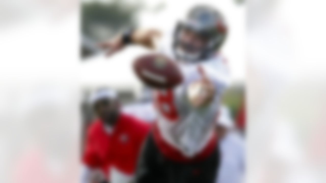 Tampa Bay Buccaneers tight end Luke Stocker reaches for a pass during a workout at NFL football training camp, Saturday, July 28, 2012, in Tampa, Fla. (AP Photo/Mike Carlson)