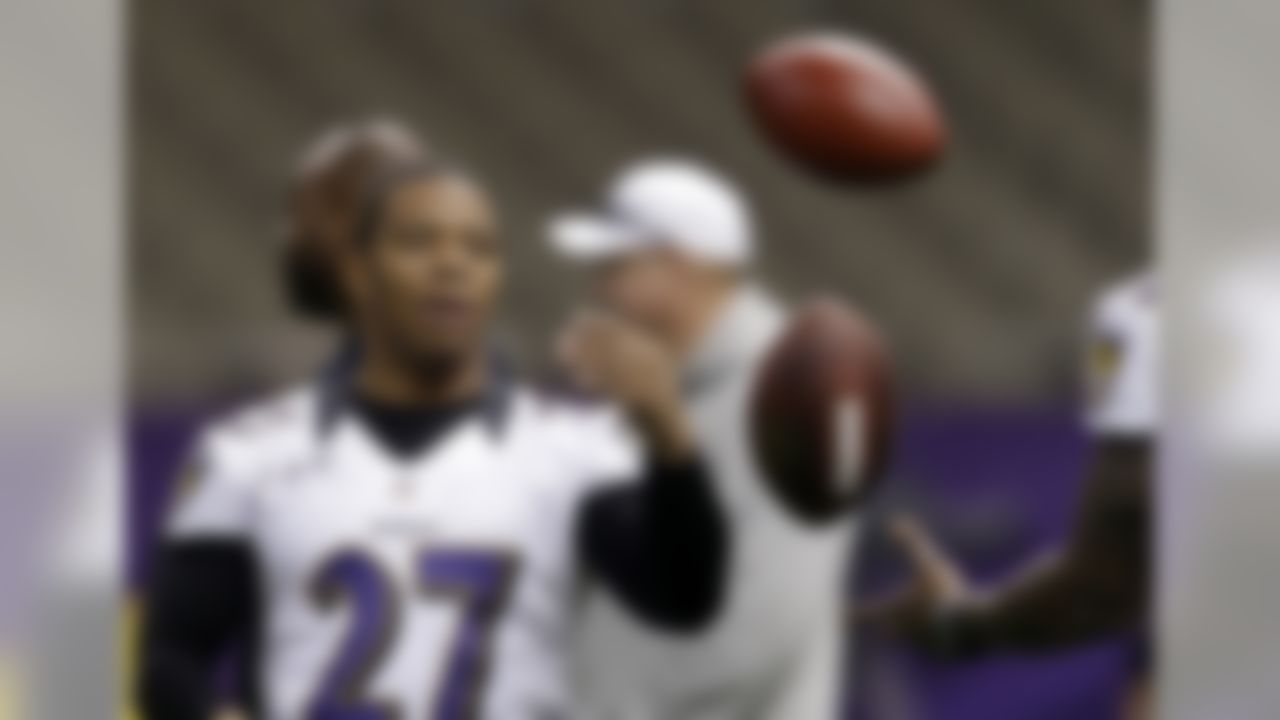 Baltimore Ravens running back Ray Rice tosses footballs to teammate Anquan Boldin during an NFL Super Bowl XLVII walkthrough on Saturday, Feb. 2, 2013, in the Mercedes-Benz Superdome in New Orleans. The Ravens face the San Francisco 49ers in Super Bowl XLVII on Sunday. (AP Photo/Patrick Semansky)