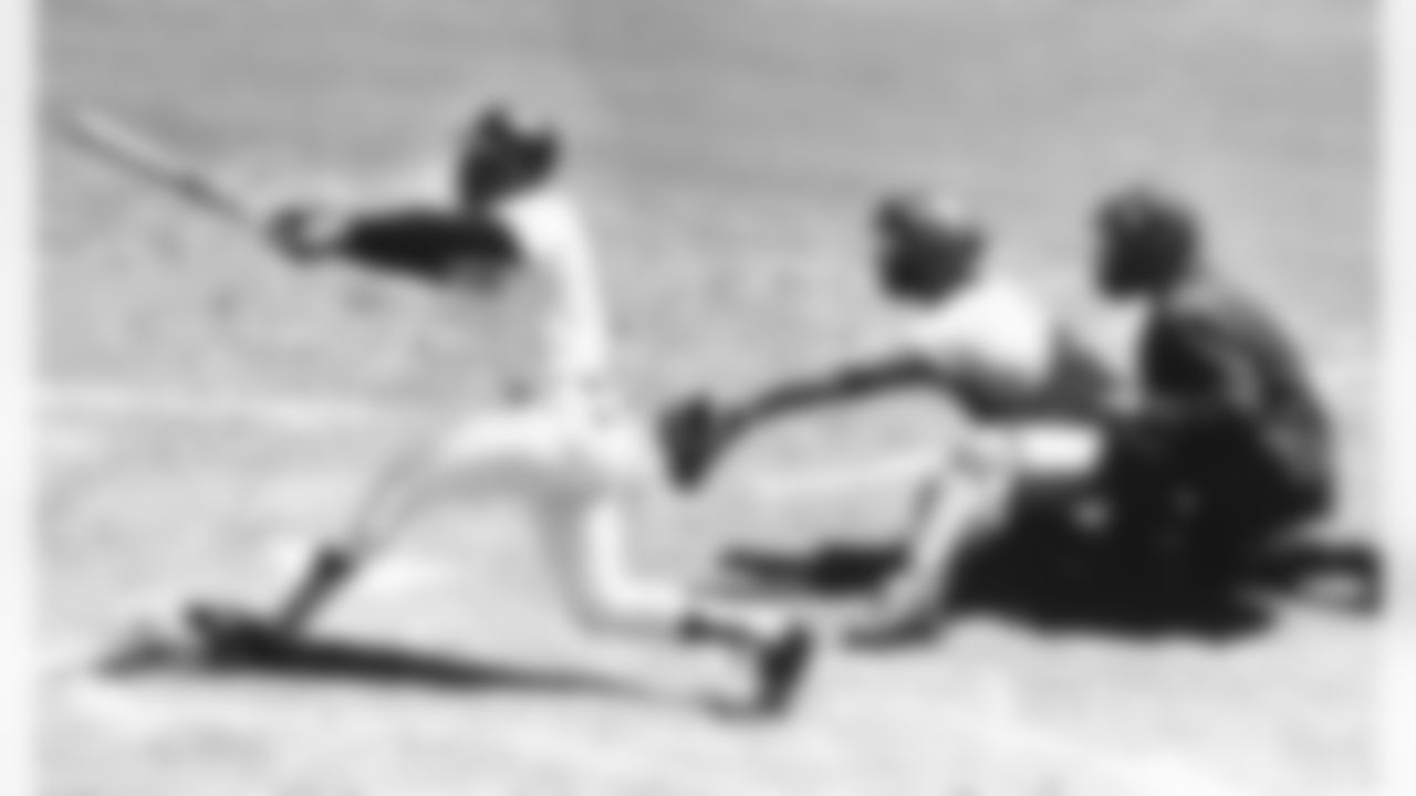 Willie Mays, center field slugger of the San Francisco Giants, connects with the 3,000th hit of his career a single to left-in second inning against Montreal on July 18, 1970 at Candlestick Park in San Francisco. Expos catcher John Bateman waits for pitch from teammate Mike Wegener. It never arrived. Umpire is Mel Steiner. Mays received the ball immediately at ceremony on the field. (Associated Press)