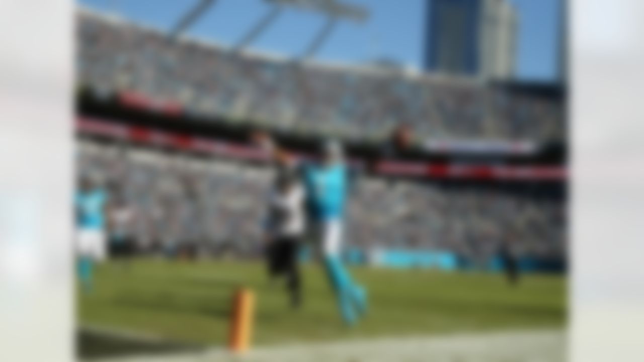 Carolina Panthers' Cam Newton (1) runs for a touchdown against the Baltimore Ravens' Terrell Suggs (55) in the second half of an NFL football game in Charlotte, N.C., Sunday, Oct. 28, 2018.