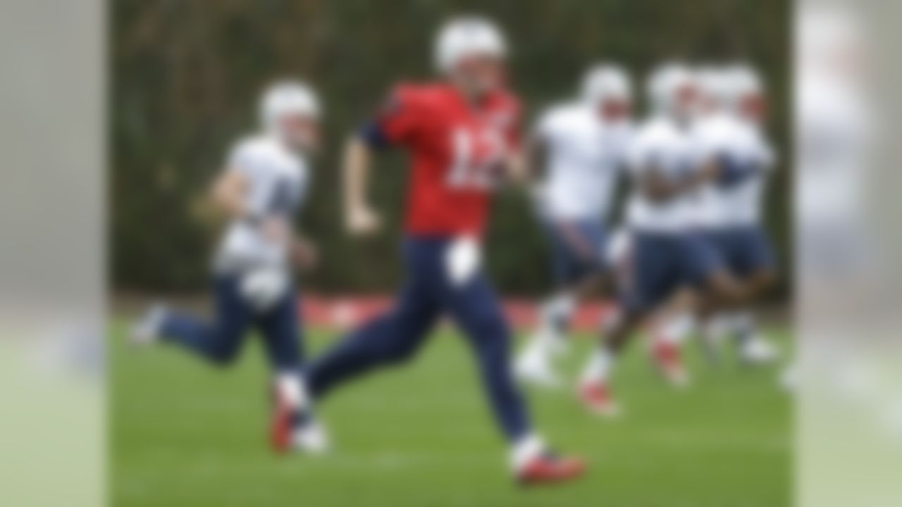 New England Patriots quarterback Tom Brady (12) warms up during practice Friday, Jan. 30, 2015, in Tempe, Ariz. The Patriots play the Seattle Seahawks in NFL football Super Bowl XLIX Sunday, Feb. 1. (AP Photo/Mark Humphrey)