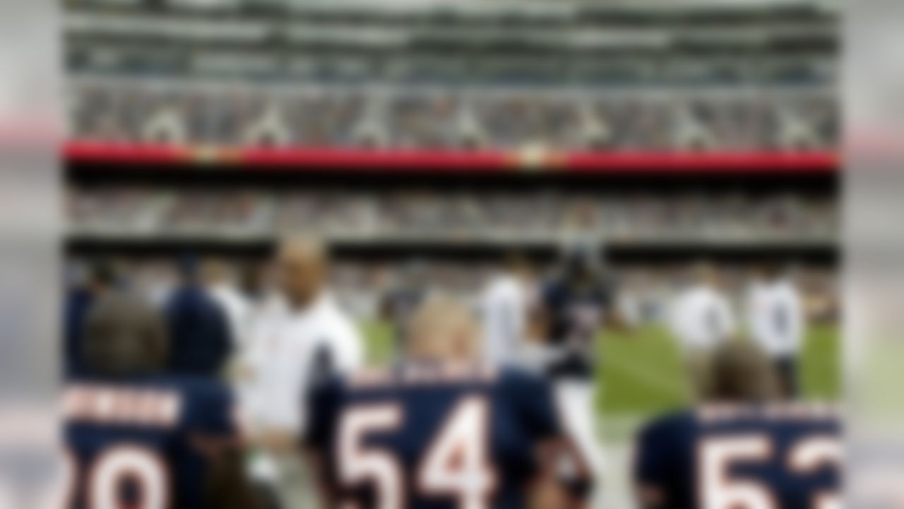 Chicago Bears linebacker Brian Urlacher (54) on the bench with teammates during a Week 9 NFL football game against the San Diego Chargers at Soldier Field in Chicago, Illinois on November 2, 2003. The Bears defeated the Chargers 20-7. (AP Photo/Scott Boehm)