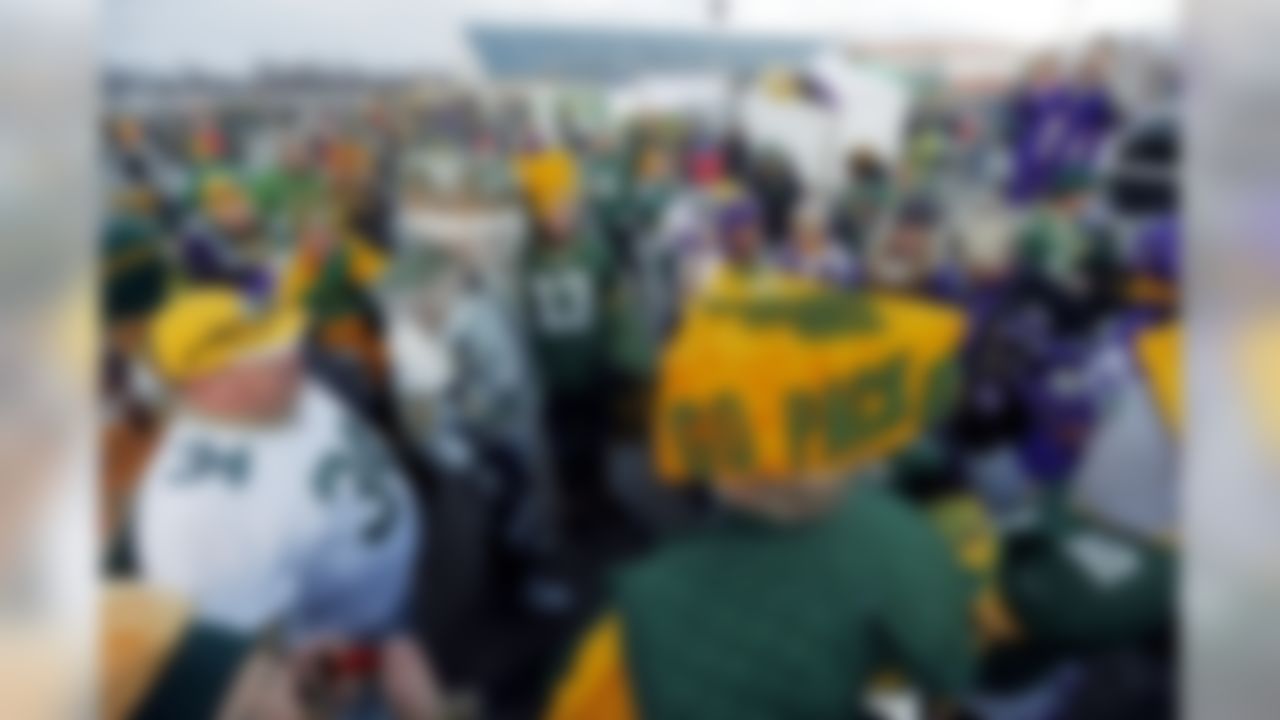 Fans tailgate before an NFL football game between the Green Bay Packers and the Minnesota Vikings Sunday, Jan. 3, 2016, in Green Bay, Wis. (AP Photo/Mike Roemer)