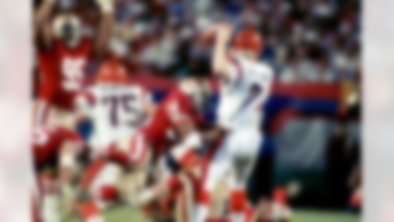 Cincinnati Bengals quarterback Boomer Esiason (7) gets ready to throw the ball before being dragged down by San Francisco 49ers Hall of Fame defensive end Charles Haley (94) during Super Bowl XXIII on Jan. 22, 1989, at Joe Robbie Stadium in Miami. The 49ers defeated the Bengals 20�16. (Tony Tomsic via AP)
