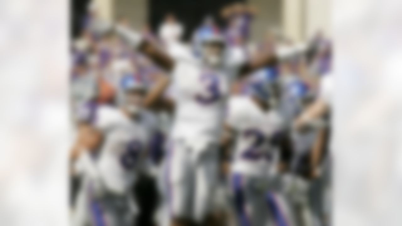 Kansas cornerback Aqib Talib (3) celebrates after intercepting a pass during the fourth quarter of a football game against Kansas State Saturday, Oct. 6, 2007 in Manhattan, Kan. Kansas won 30-24. (AP Photo/Charlie Riedel)