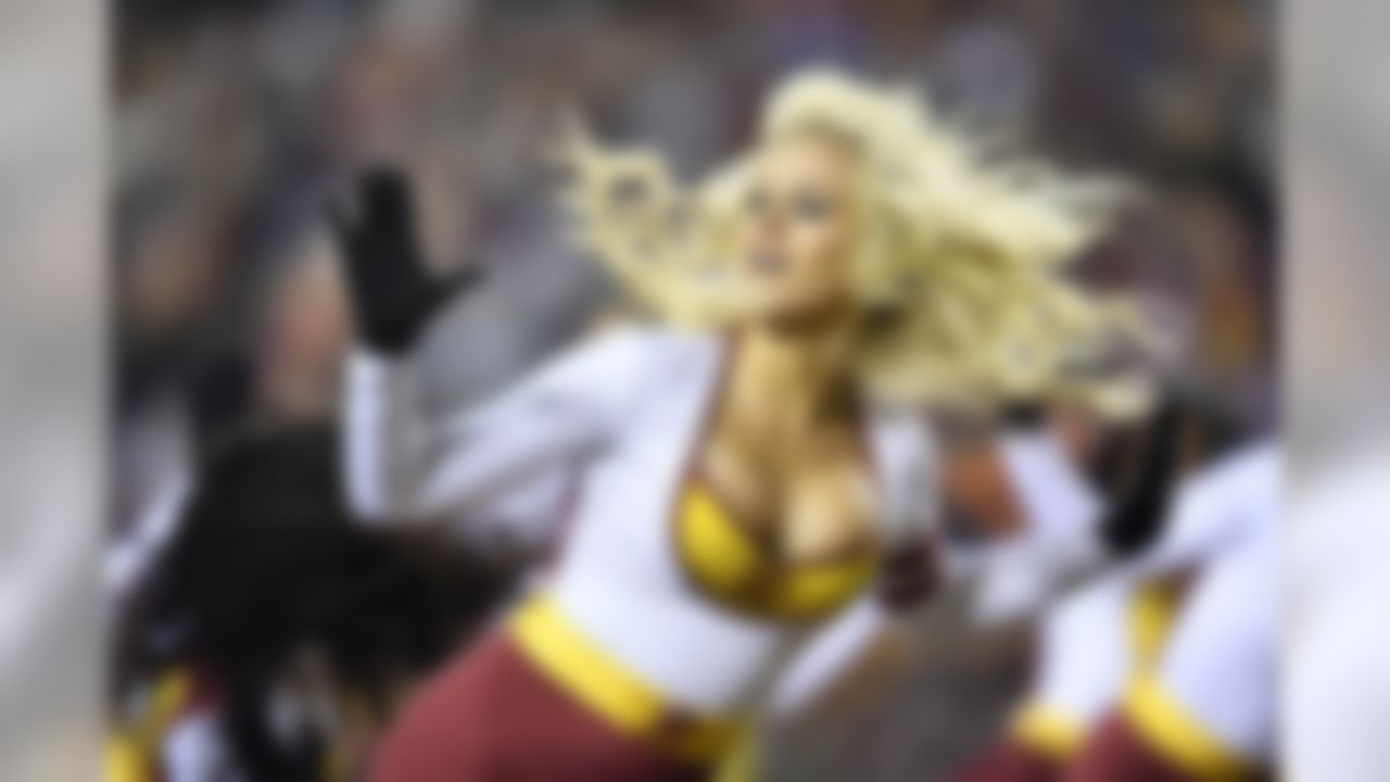 A Washington Redskins cheerleader performs during a NFL football game against the New York Giants on Thursday, November 23, 2017 in Landover, MD.
