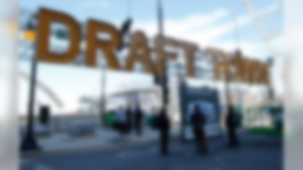 A sign is hung in Draft Town at Grant Park in preparation for the 2015 NFL Draft in Chicago, Ill., on April 27, 2015. (Ben Liebenberg/NFL)