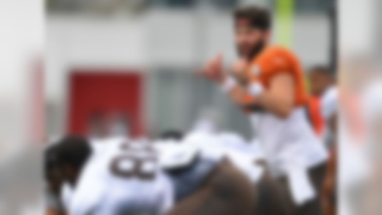 Cleveland Browns quarterback Baker Mayfield signals during NFL football training camp Tuesday, Aug. 7, 2018, in Berea, Ohio.