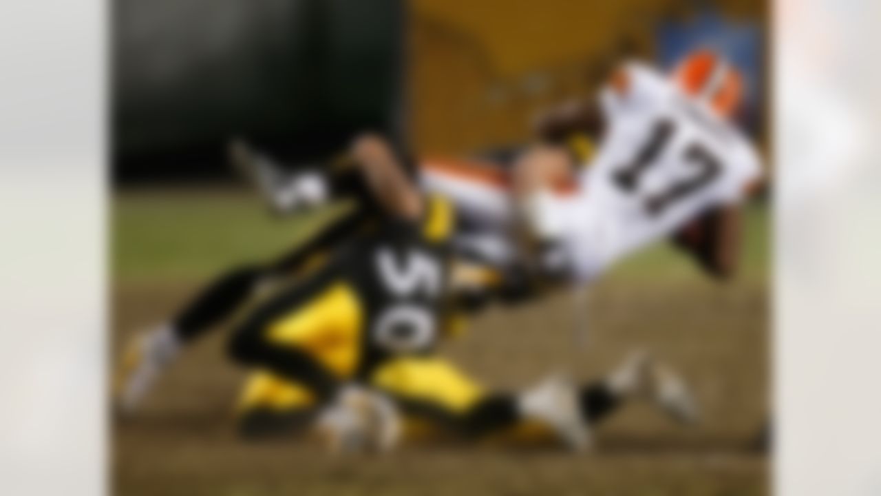 PITTSBURGH - DECEMBER 07: Braylon Edwards #17 of the Cleveland Browns is tackled by Larry Foote #50 of the Pittsburgh Steelers December 7, 2006 at Heinz Field in Pittsburgh, Pennsylvania. The Steelers won 27-7. Photo by Getty Images.
