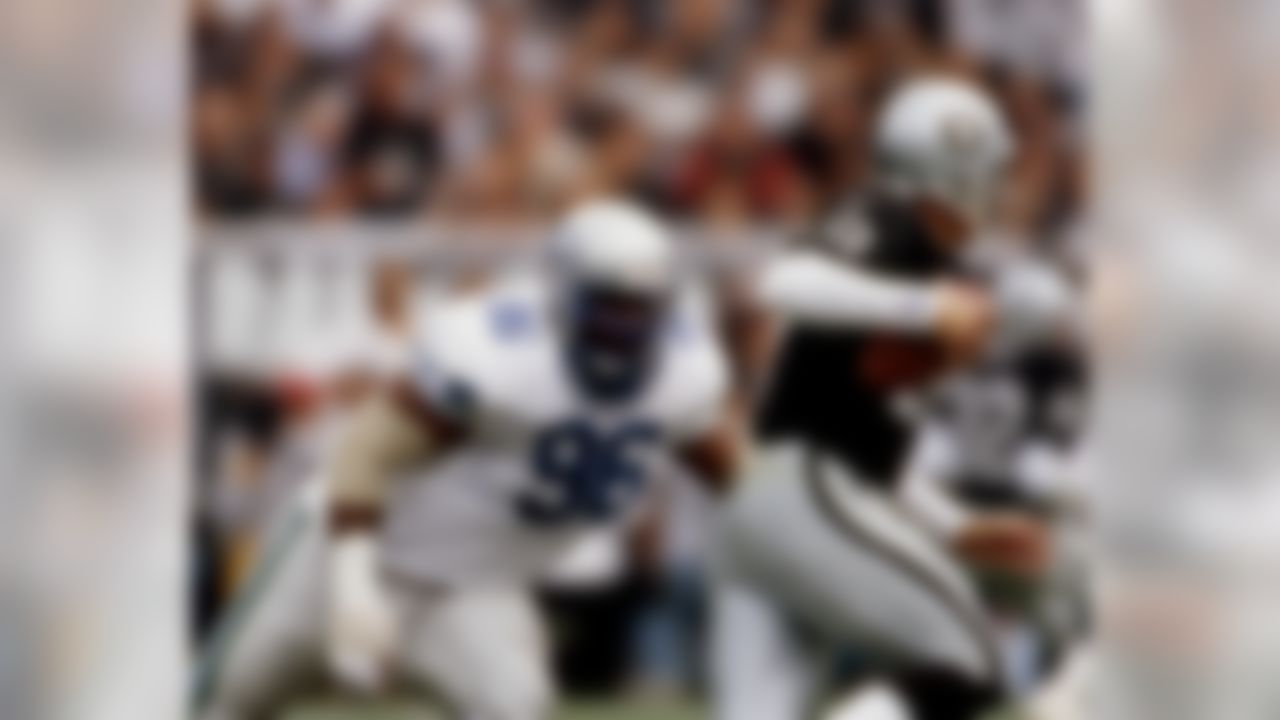 Seattle Seahawks Hall of Fame defensive tackle Cortez Kennedy (99) runs in pursuit during an NFL game against the Los Angeles Raiders, Nov. 15, 1998. The Raiders defeated the Seahawks 20-17 at the Los Angeles Coliseum. (AP Photo/NFL Photos/Kevin Terrell)