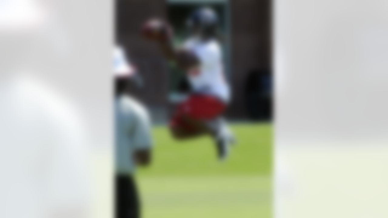 Atlanta Falcons cornerback Asante Samuel works out during a training camp session, Saturday, July, 28, 2012. (AP Photo/John Amis)