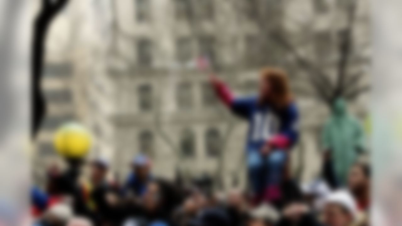 NEW YORK - FEBRUARY 05: A young fan waves an American flag during the New York Giants Super Bowl XLII victory parade February 5, 2008 in New York City. (Photo by Nick Laham/Getty Images)