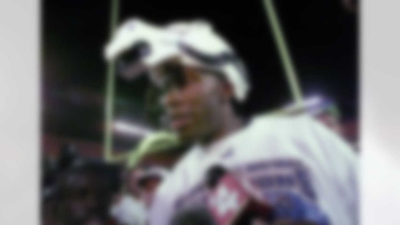 Denver Broncos' Shannon Sharpe wears a Broncos hat after the Broncos 34-19 win over the Atlanta Falcons in Super Bowl XXXIII in Miami, Sunday, Jan. 31, 1999. Denver tight end Shannon Sharpe twisted his left knee in the first quarter of the Super Bowl and, after appearing briefly later in the quarter, was out for the rest of the game. Sharpe was hurt when he was hit on his knee and flipped over by cornerback Ray Buchanan's tackle on a 14-yard reception to the Atlanta 1-yard line. (AP Photo/Dave Martin)