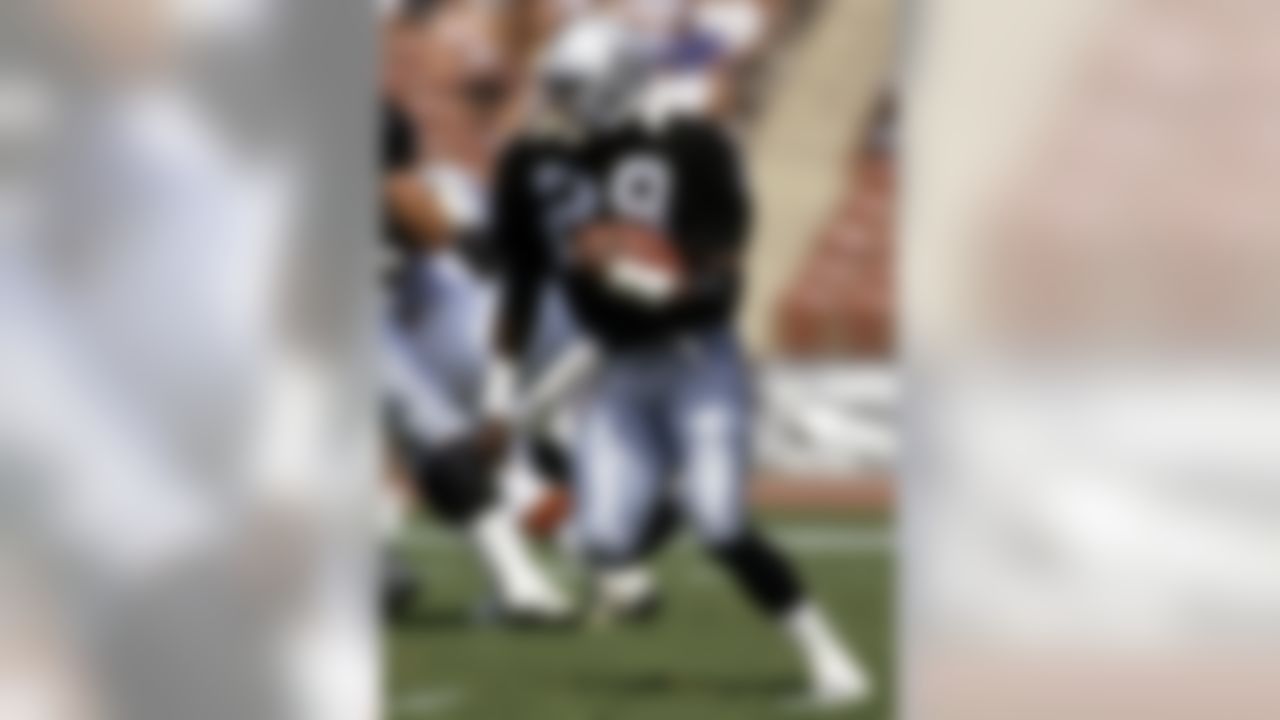 Hall of Fame running back Eric Dickerson (29) of the Los Angeles Raiders carries the football during the Raiders 28-16 loss to the Cleveland Browns on September 20, 1992 at the Los Angeles Memorial Coliseum in Los Angeles, California. (George Long/NFL)