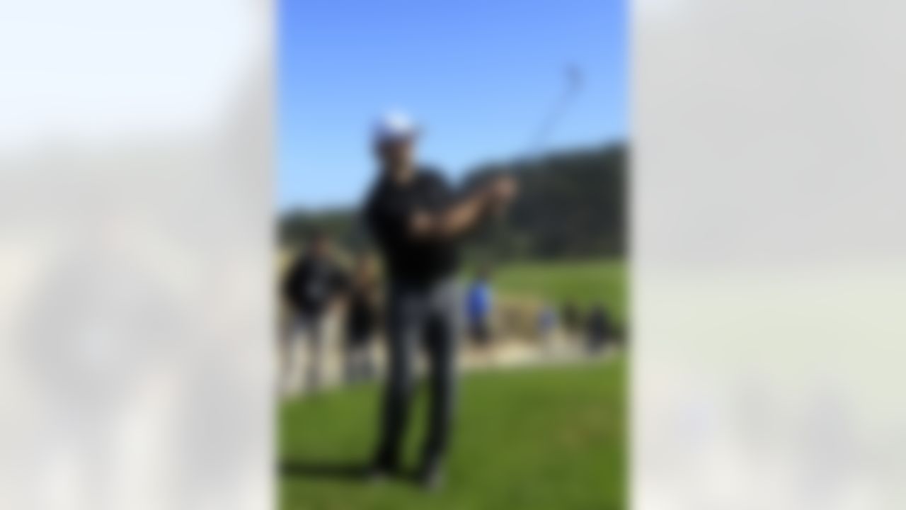 Green Bay Packers quarterback Aaron Rodgers hits toward the second hole at Spyglass Hill Golf Course during the first round of the AT&T Pebble Beach National Pro-Am golf tournament in Pebble Beach, Calif., Thursday, Feb. 9, 2012. (AP Photo/Jeff Chiu)