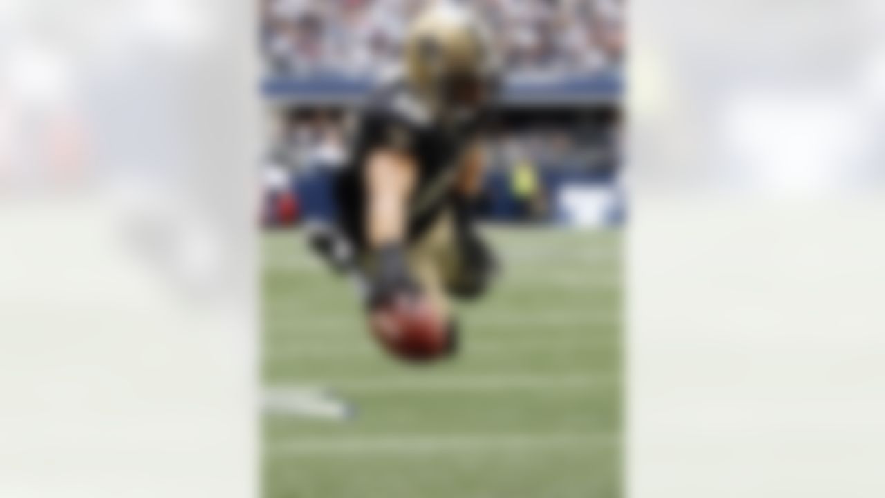 New Orleans Saints wide receiver Lance Moore (16) goes in for a touchdown against the Dallas Cowboys during the first half of an NFL football game on Sunday, Dec. 23, 2012, in Arlington, Texas. (AP Photo/Sharon Ellman)