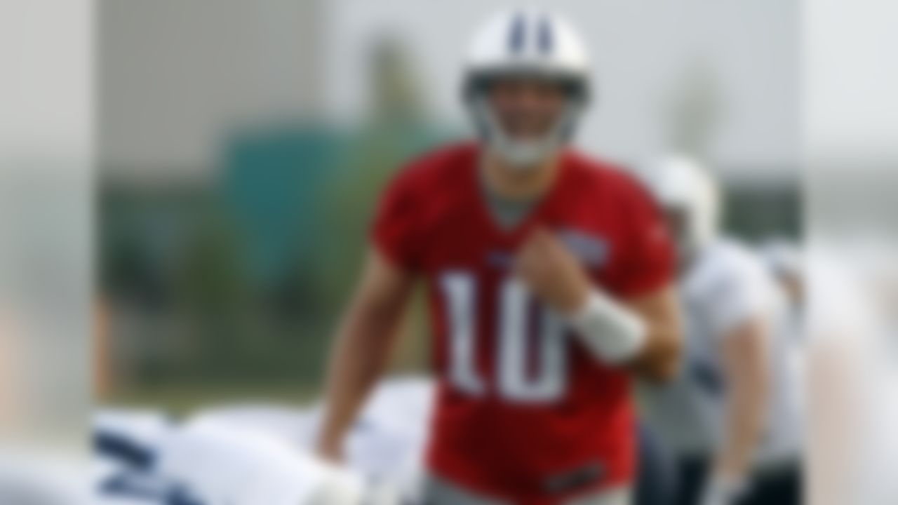Tennessee Titans quarterback Jake Locker calls a play during NFL football camp at Titans' headquarters Sunday, July 29, 2012 Nashville, Tenn. (AP Photo/Wade Payne)