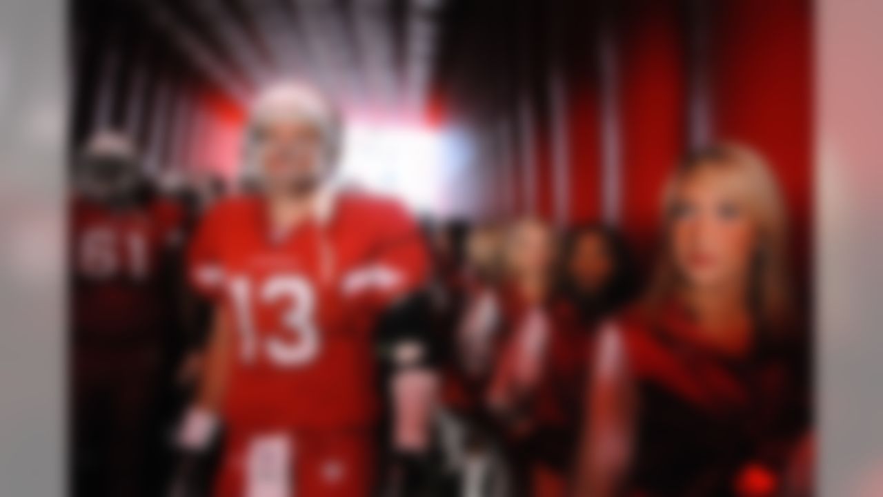 Dec. 30, 2007; Glendale, AZ, USA; Arizona Cardinals quarterback Kurt Warner (13) and the Cardinals cheerleaders prior to the game against the St Louis Rams at University of Phoenix Stadium. Arizona defeated St Louis 48-19. Mandatory Credit: Mark J. Rebilas-US PRESSWIRE