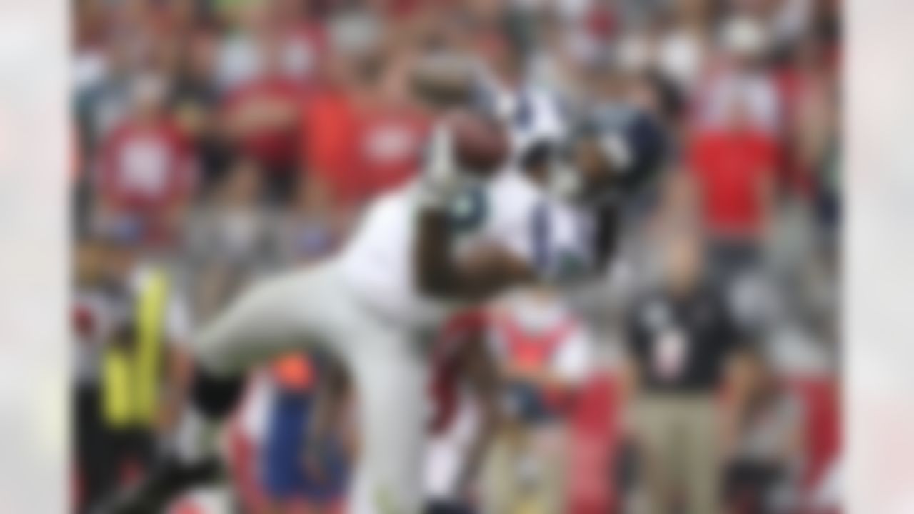 Seattle Seahawks' Sidney Rice catches a pass against the Arizona Cardinals in an NFL football game Sunday, Sept. 9, 2012, in Glendale, Ariz. (AP Photo/Paul Connors)