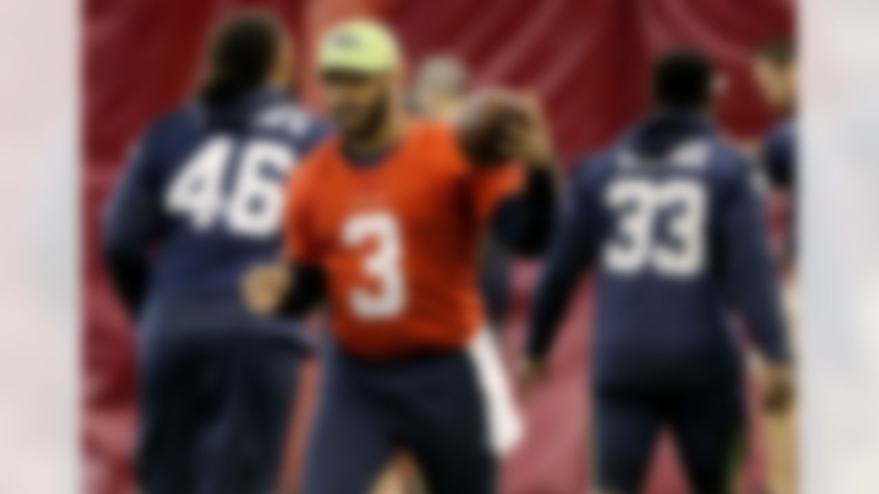 Seattle Seahawks quarterback Russell Wilson (3) runs drills during a team practice for NFL Super Bowl XLIX football game, Friday, Jan. 30, 2015, in Tempe, Ariz. The Seahawks play the New England Patriots in Super Bowl XLIX on Sunday, Feb. 1, 2015. (AP Photo/Matt York)