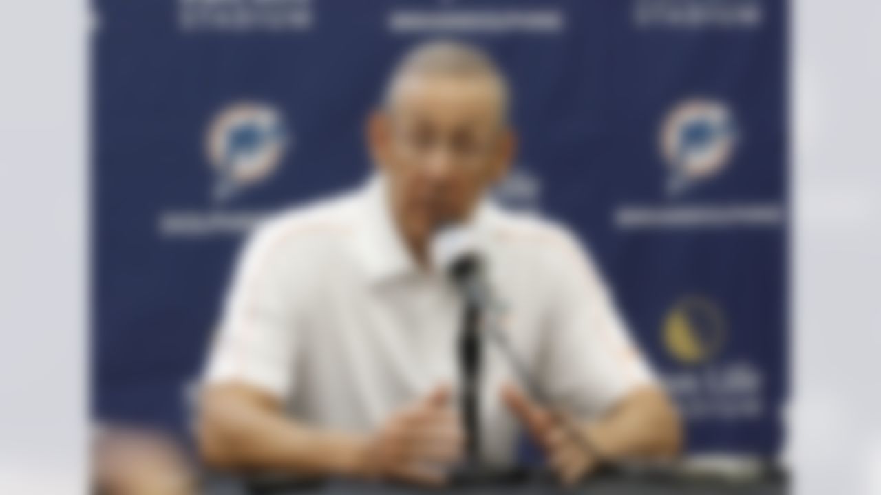 Miami Dolphins' owner Stephen Ross gestures as he talks to reporters after practice at NFL football training camp in Davie, Fla., Friday, July 27, 2012. (AP Photo/Alan Diaz)