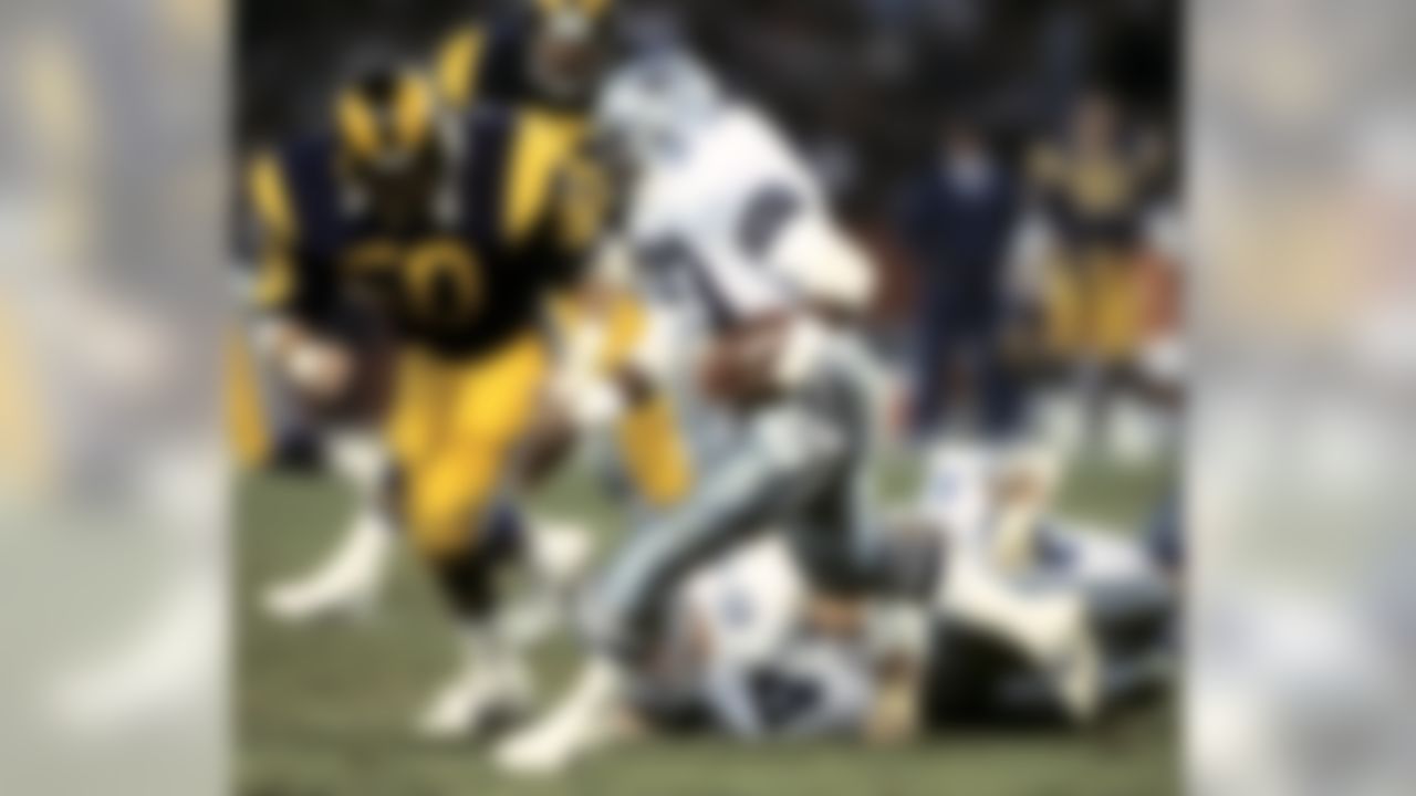 Los Angeles Rams linebacker Jim Collins (50) has the angle on Dallas Cowboys Hall of Fame running back Tony Dorsett (33) during a 29-21 Cowboys victory on December 21, 1987, at Anaheim Stadium in Anaheim, California. (National Football League)