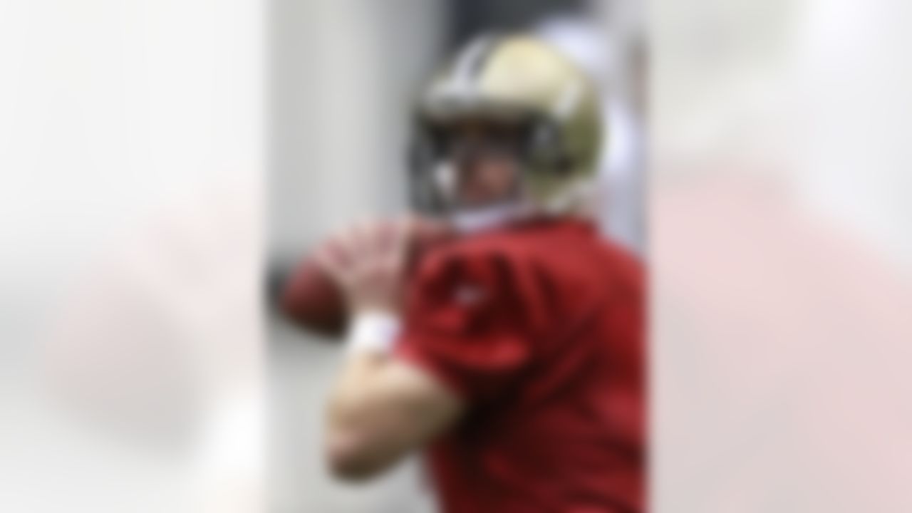 New Orleans Saints quarterback Drew Brees works out during the first practice at NFL football training camp in Metairie, La., Thursday, July 26, 2012. (AP Photo/Gerald Herbert)