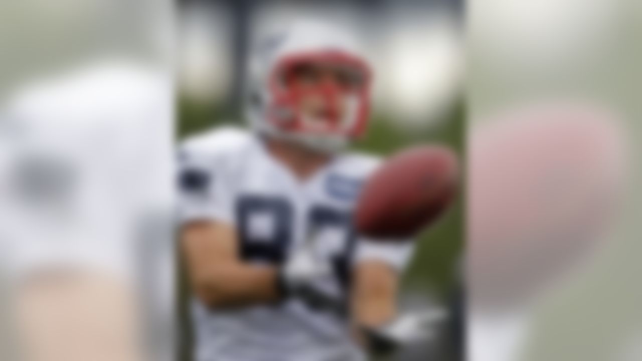 New England Patriots wide receiver Wes Welker (83) makes a catch during a team NFL football training camp in Foxborough, Mass., Sunday, July 29, 2012. (AP Photo/Steven Senne)