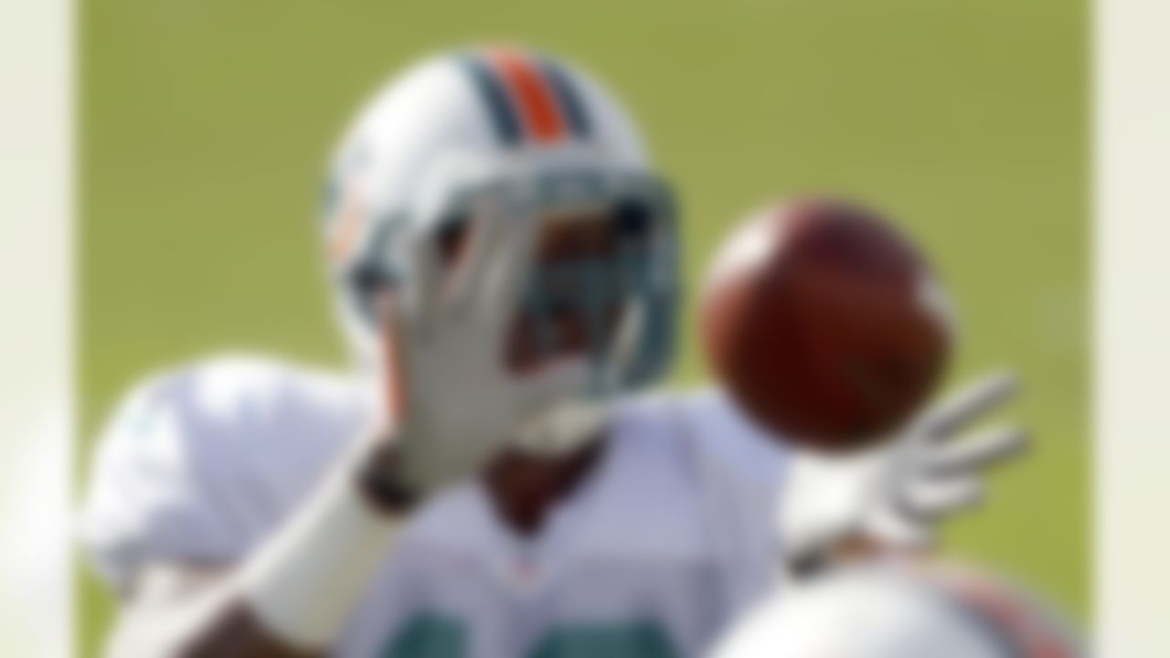 Miami Dolphins' Jonathan Freeny practices during NFL football training camp in Davie, Fla., Monday, Aug. 13, 2012. (AP Photo/Alan Diaz)