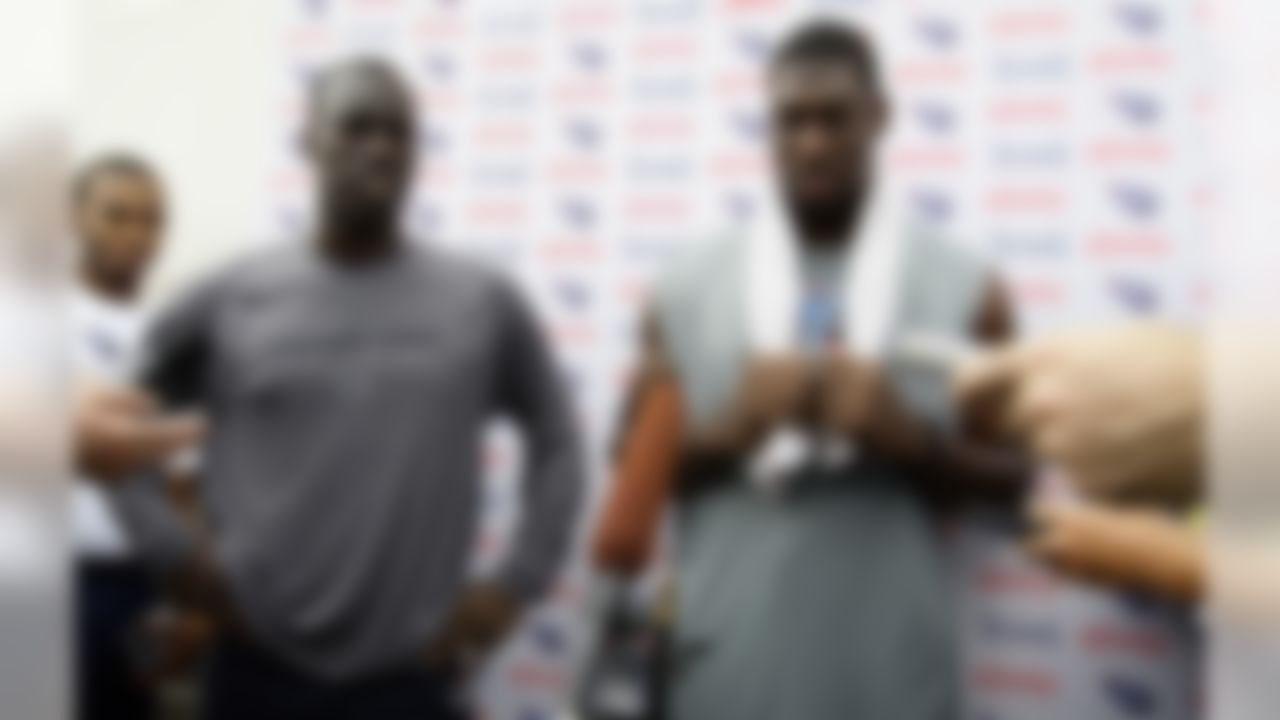 Tennessee Titans wide receiver Damian Williams. left, and Jared Cook talk about the apparent suicide of teammate O.J. Murdock after practice at a NFL football camp at Titans' headquarters Monday, July 30, 2012 Nashville, Tenn. Murdock was staying with Williams and was a teammate of Cook's in college. (AP Photo/Wade Payne)