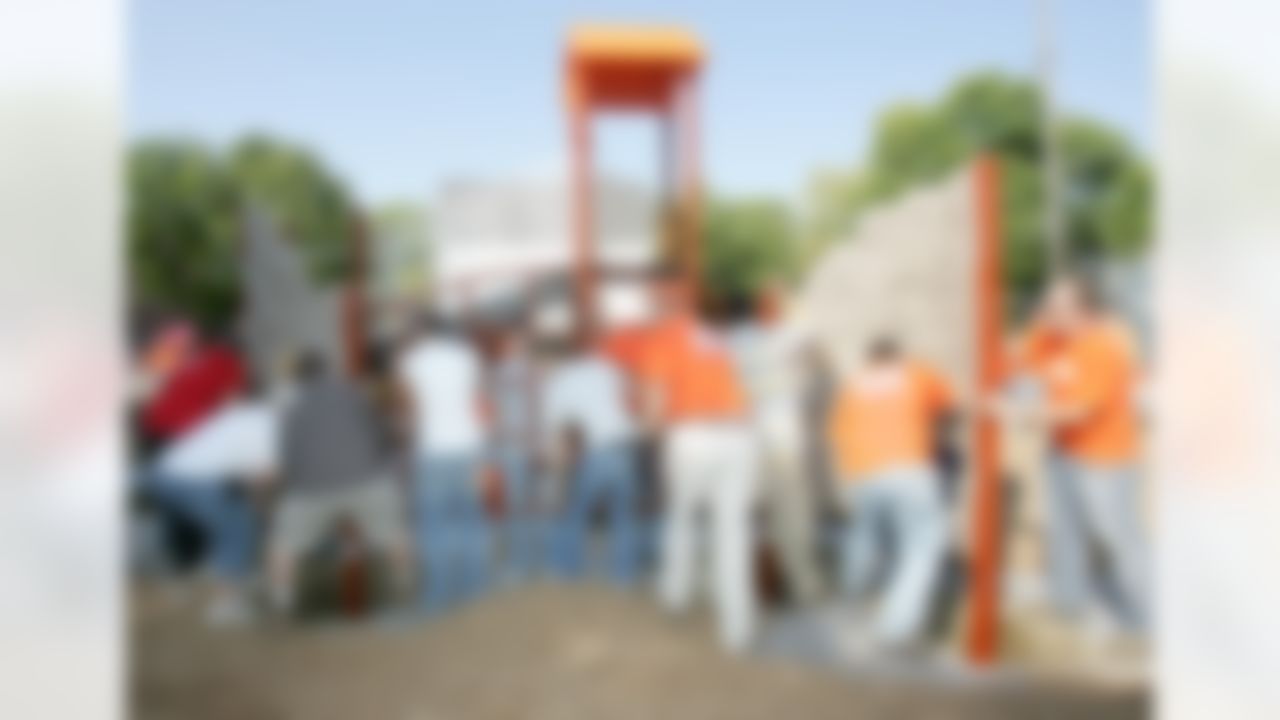 The Home Depot associates and 50 KaBOOM! volunteers build a state-of-the-art playground. (Photo by Alan Marler/CIA Stock Photography, Inc.)