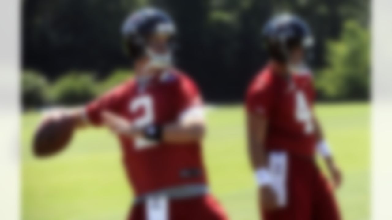 Atlanta Falcons quarterbacks Matt Ryan, left, and John Parker Wilson work out during an NFL football training camp session on Saturday, July, 28, 2012. (AP Photo/John Amis)