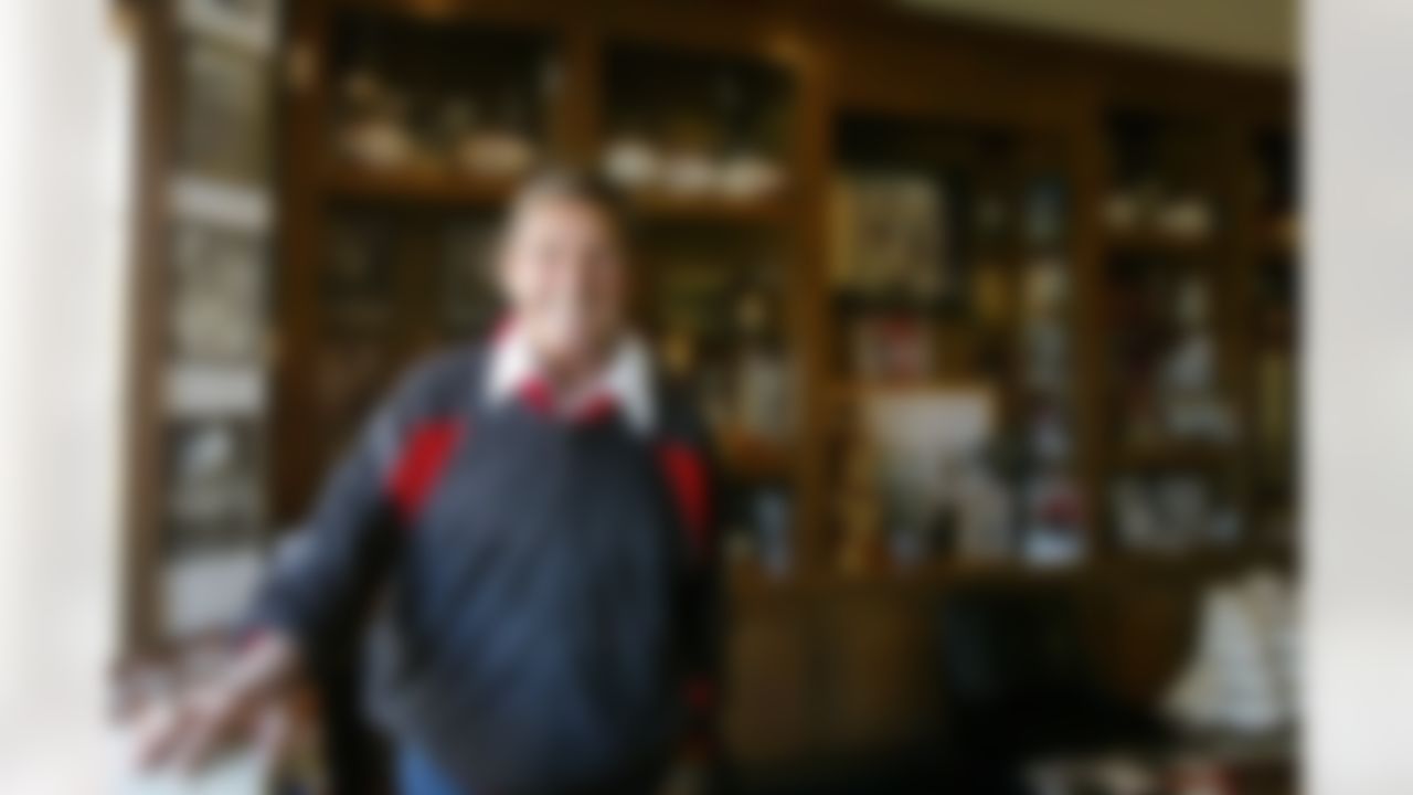 Hank Stram poses in his room with many of his awards at his home in suburban New Orleans, Tuesday, Dec. 17, 2002. (AP photo/Judi Bottoni)