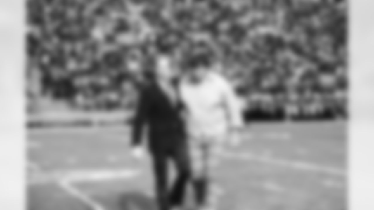 Old friends and former teammates Bart Starr, left, and Forrest Gregg meet, Saturday, Sept. 5, 1977 at midfield in Green Bay, Wisconsin, before the Green Bay Packers faced the Cleveland Browns in a pre season contest. Starr now the head coach of the Packers and Gregg the head coach of the Browns were teammates on the Packers during the glory years in the '60s. Both were inducted into the NFL Hall of Fame together this year. The Browns defeated the Packers 19-14 in the pre season game. (AP Photo/Steve Pyle)