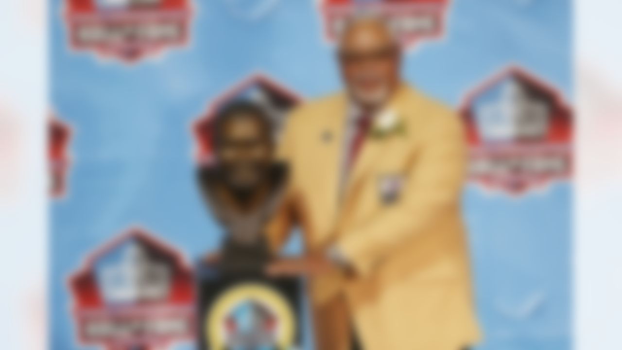 Curley Culp poses with his NFL bust during the 2013 Pro Football Hall of Fame Enshrinement Ceremony in Canton, Oh., on Aug. 3, 2013. (Ben Liebenberg/NFL)