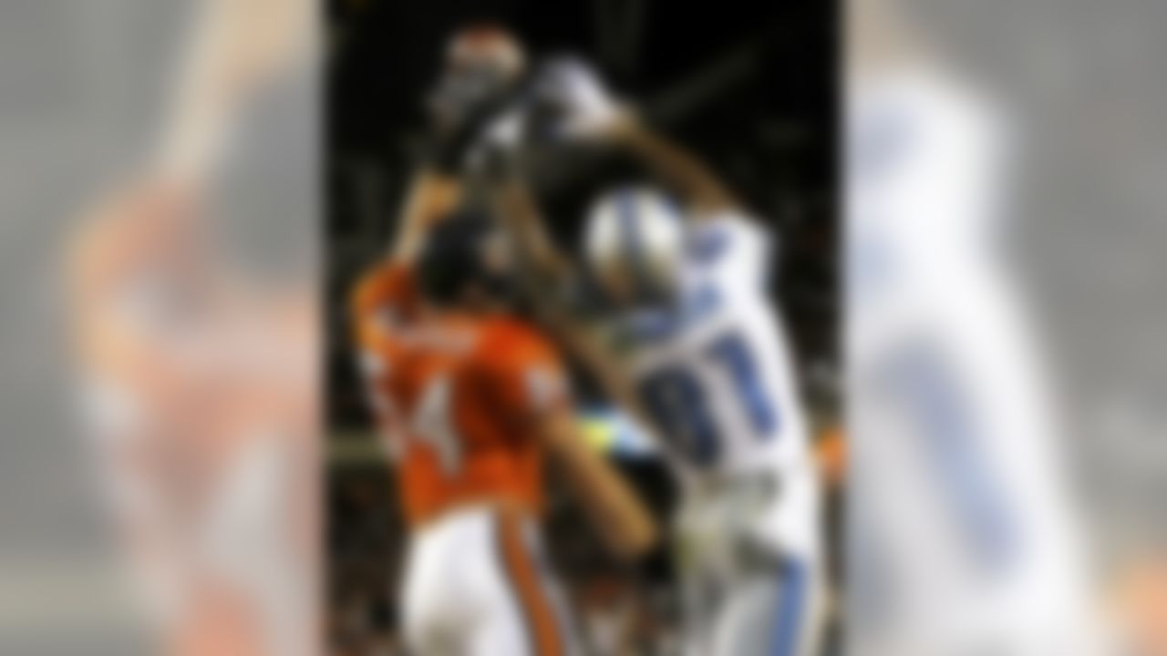 Chicago Bears linebacker Brian Urlacher (54) breaks up a pass intended for Detroit Lions wide receiver Calvin Johnson (81) in the second half of an NFL football game in Chicago, Sunday, Nov. 13, 2011. The Bears won 37-13. (AP Photo/Charles Rex Arbogast)