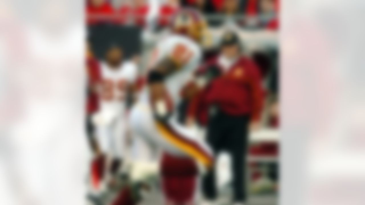 Washington Redskins' Sean Taylor runs 51 yards for a touchdown after picking up a Tampa Bay Buccaneers fumble during the first quarter of in an NFC Divisional playoff football game Saturday, Jan 7, 2006 in Tampa, Fla. (AP Photo/Steve Nesius)
