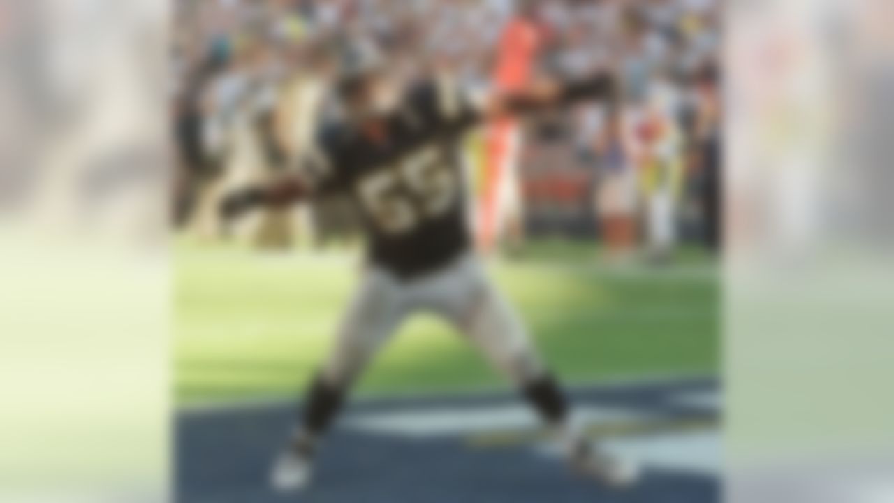 San Diego Chargers' Junior Seau celebrates after breaking up a last-minute fourth-quarter pass against the Kansas City Chiefs during the Chargers 21-14 victory, Sunday, Oct. 3, 1999, in San Diego. (AP Photo/Lenny Ignelzi)